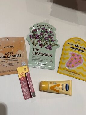 Two Face masks Foot mask Vaseline lotion Burt’s bees lip shimmer 5 NWT items